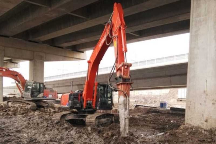 Heavy excavator performing commercial soil removal and excavation in Garland, TX