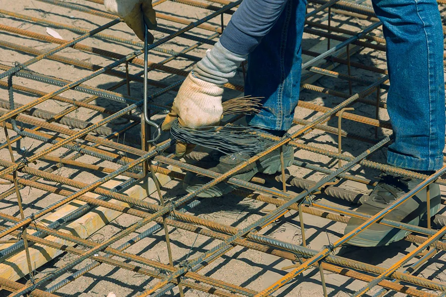 Rebar reinforcement installation during commercial foundation repair in Garland, TX