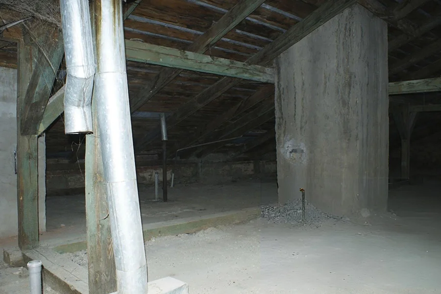 Interior crawl space view of pier and beam foundation structure inspection in Garland, TX