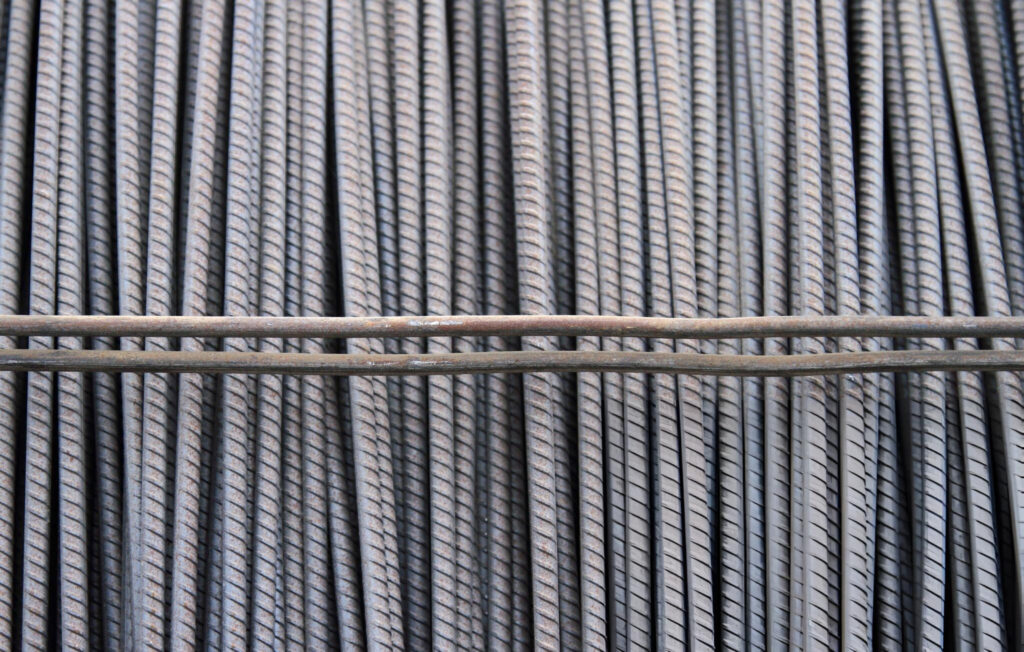 Steel rebar material used in pressed steel pilings manufacturing for Garland, TX foundations