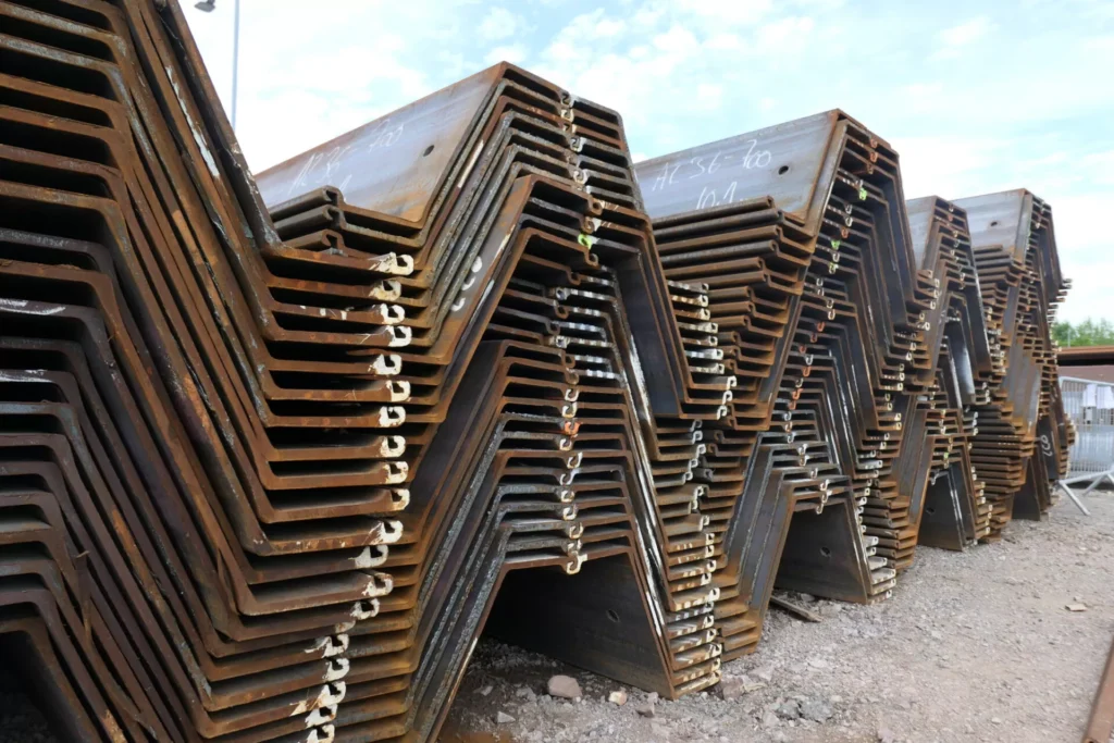 Stockpile of pressed steel pilings for residential and commercial foundation repair in Garland, TX